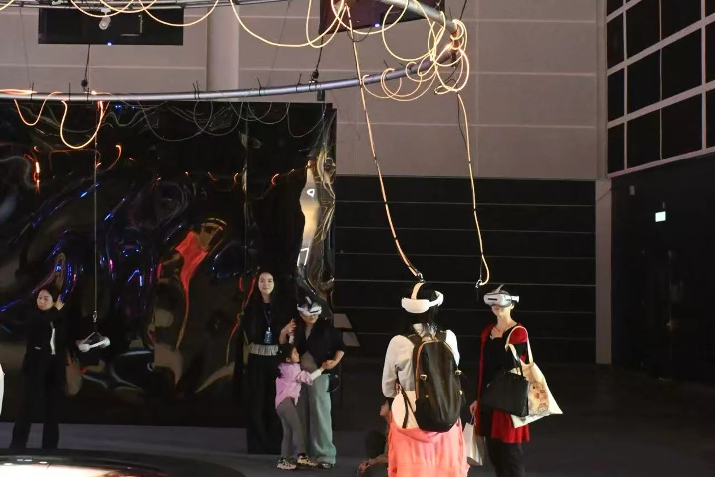 Visitors wearing VR headsets at the Deepcore installation, Hong Kong International AI Art Festival
