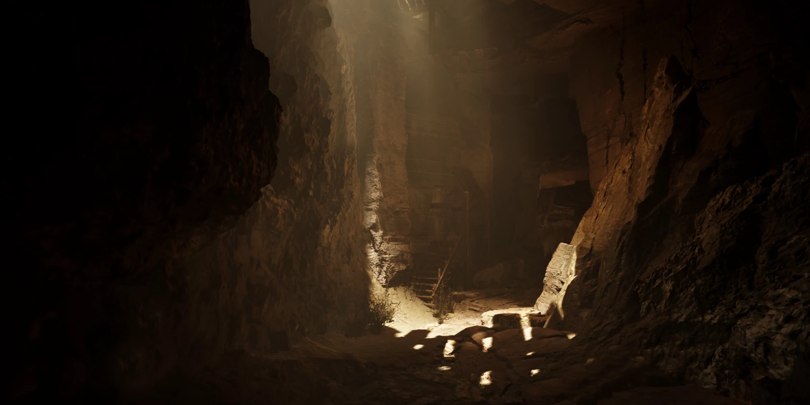 A solitary figure standing in a shaft of light inside a cavern in the Mogao Grottoes chapter