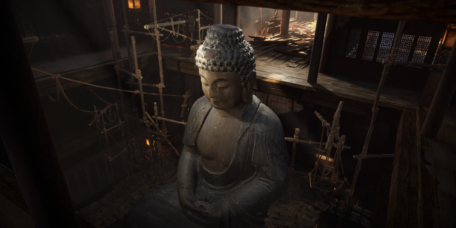 A Buddha figure surrounded by timber scaffolding in the Qixia Mountain chapter